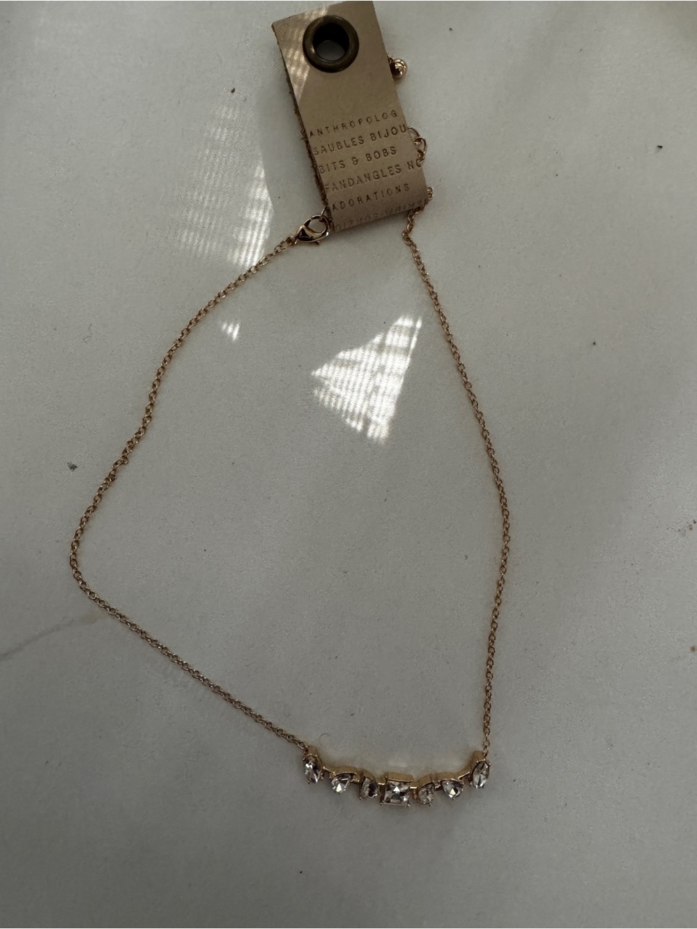 Anthropologie Gold Crystal Crescent Necklace